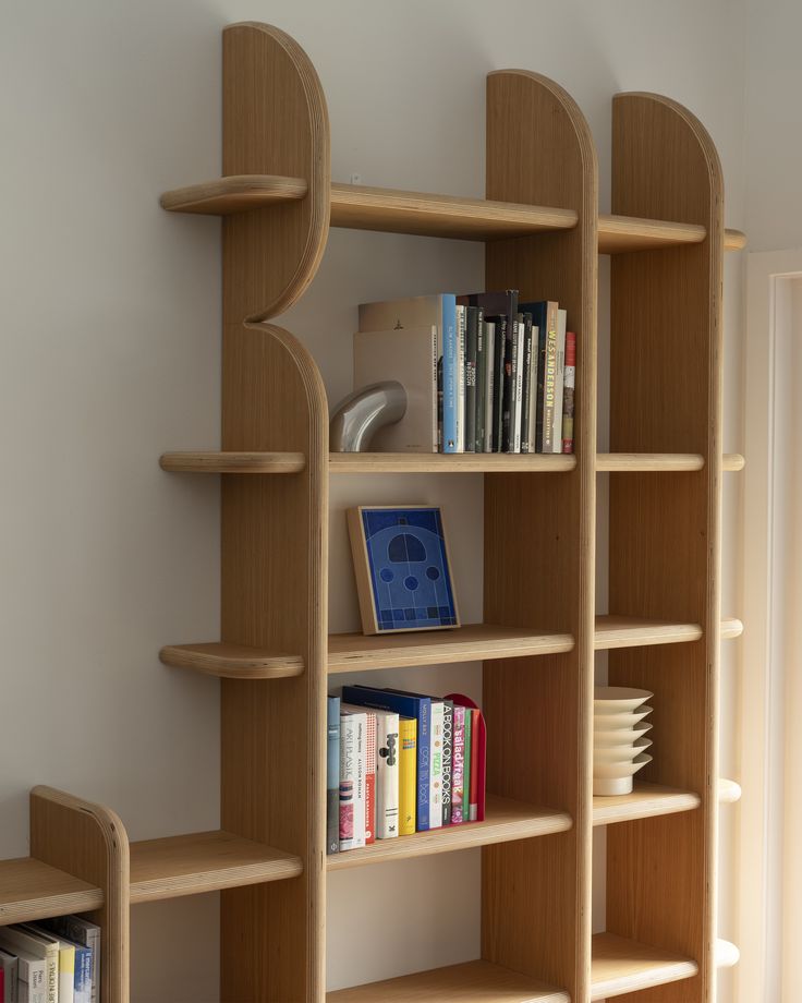 the bookshelf is made out of wood