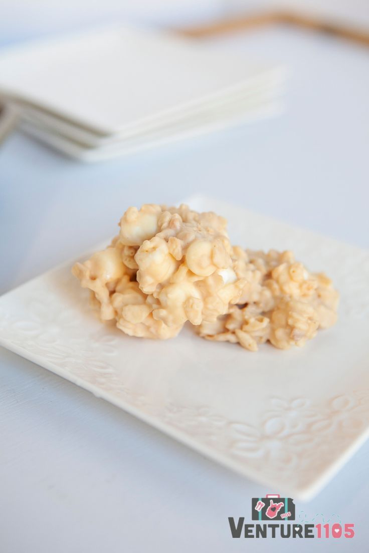 a white plate topped with food on top of a table