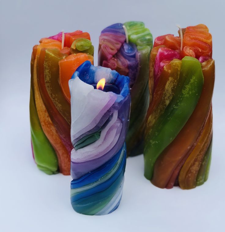 multicolored candles sitting next to each other