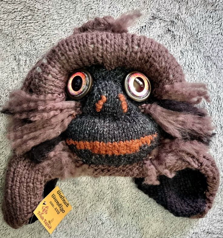 Each Bigfoot/Sasquatch hat is handmade--the combination of colors and yarn type, along with eye variations and expressions ensure that no two are exactly alike.  ITEM PICTURED IS WHAT YOU WILL RECEIVE (size in title).  Hats are warm and soft, with earflaps; each is individually named, using different world-wide terms for the Sasquatch. Sizes are suitable for adults and older children (smaller sizes can be requested).  As they are knit and do stretch, the average size fits most.  Hats come prewashed so there is no fear of shrinking.  Nearly all yarn is acrylic, but some have a small percentage of wool or other natural fiber. I have been interested in Sasquatch (the name I prefer) since childhood.  I believe that there are undiscovered species in this world, small and large, that have manage Handmade Whimsical Hat One Size, Whimsical Handmade One-size Hats, Handmade Whimsical One-size Hat, Handmade Hats For Outdoor, One Size Fits Most, Handmade Brown Hat, One Size Fits Most, Handmade Outdoor Hat One Size Fits Most, Handmade Outdoor Hat (one Size Fits Most), Handmade Outdoor Hat, Handmade Casual Brown Hat