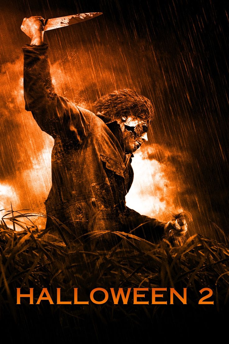 a movie poster for halloween 2 with a scarecrow holding a knife in the air