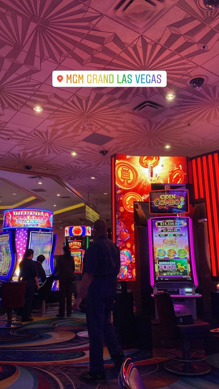 casino machines and neon lights at the mgm grand las vegas hotel & casino in las vegas, nv