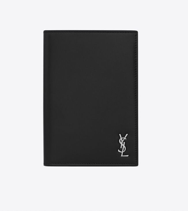 the saint laurent wallet in black leather with silver logo on the front and side pocket