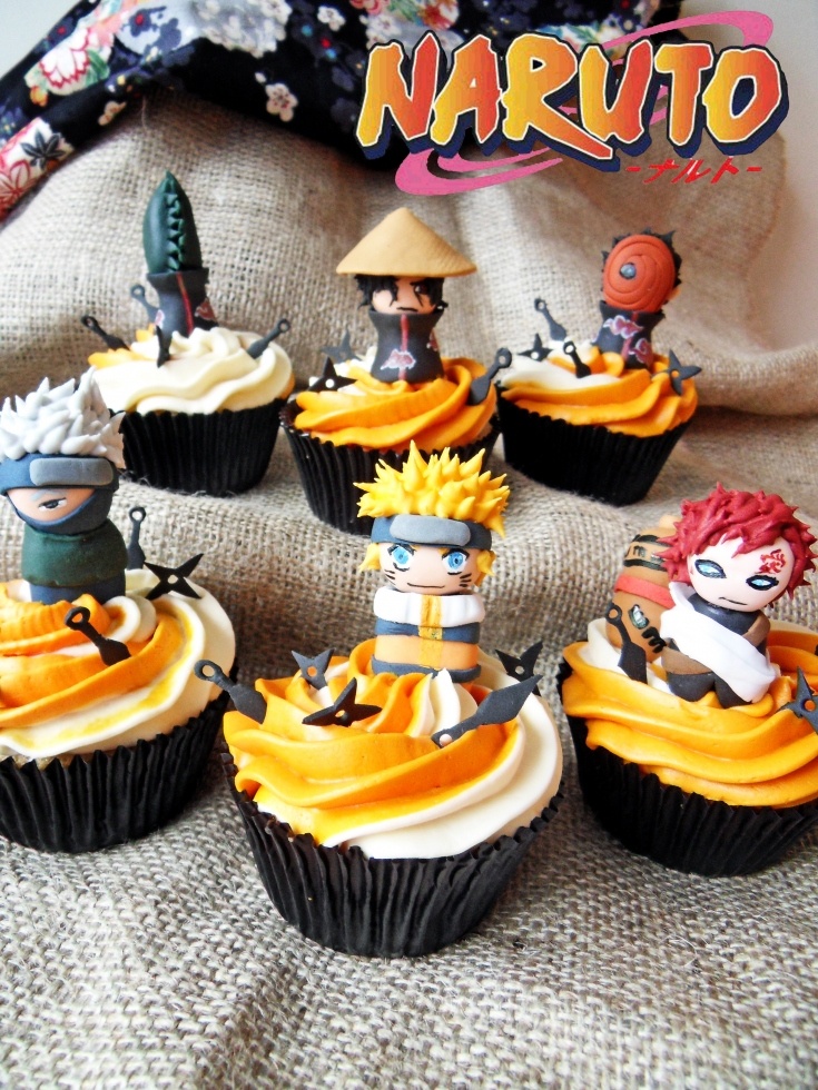 the cupcakes are decorated with naruto and other anime characters on them