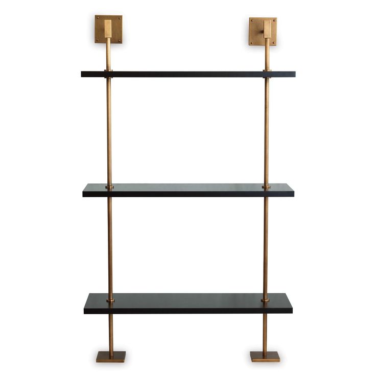 a black and gold shelf with three shelves on it, one is holding two candles