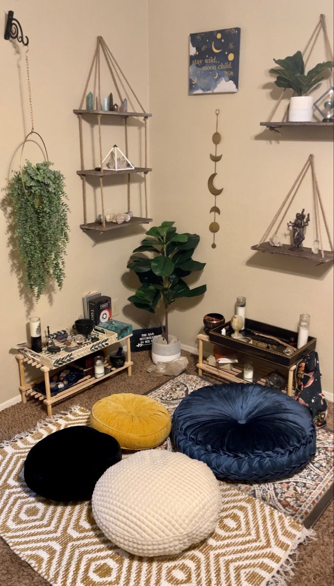 a living room filled with lots of furniture and shelves on the wall next to a potted plant