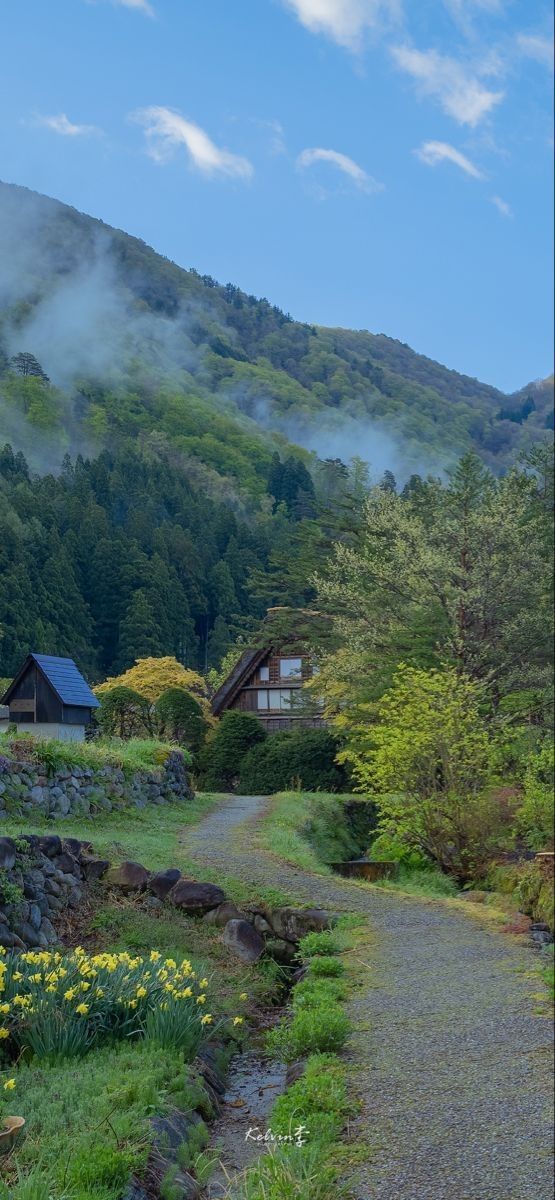 there is a small house in the mountains