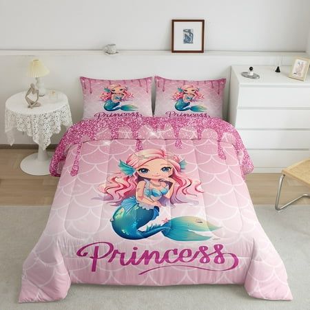 a pink bed with a mermaid on it and the word princess written in large letters