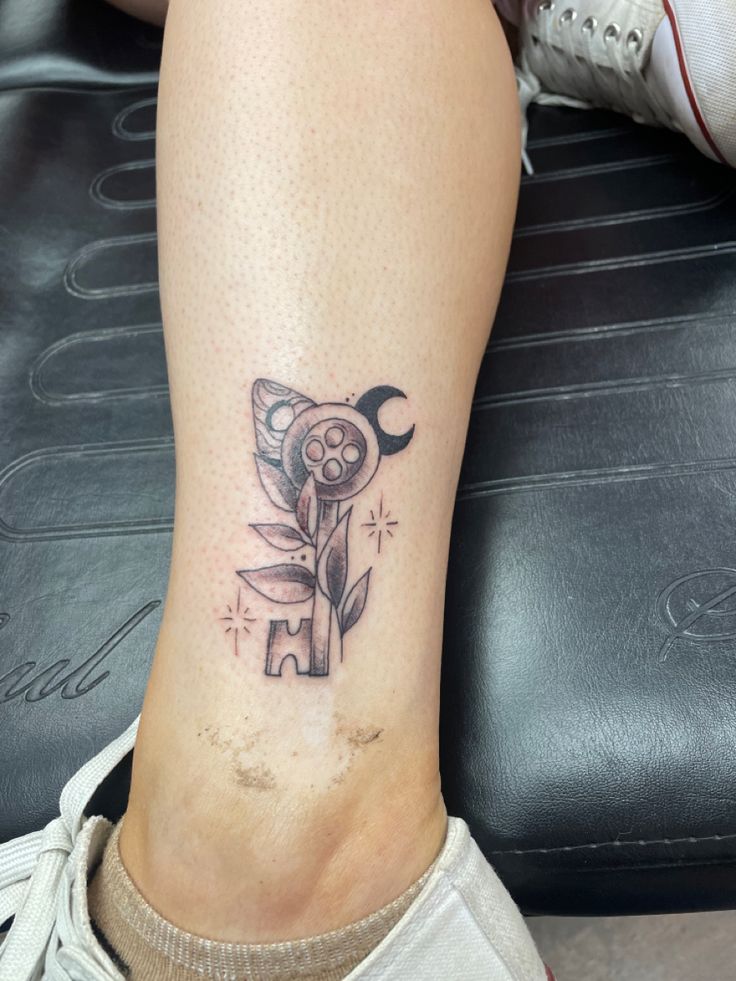 a person with a tattoo on their leg