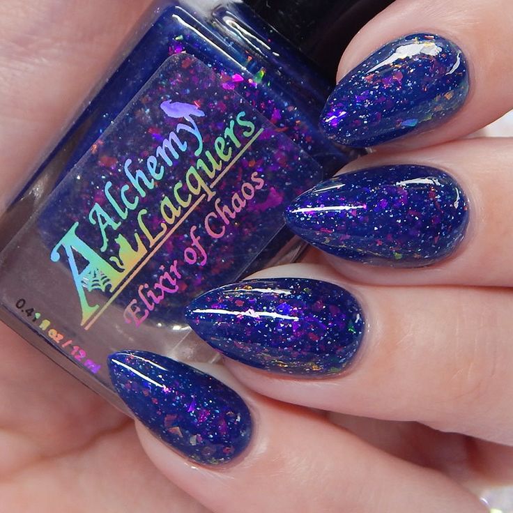 Elixir of Chaos is crafted in that very moment of sheer panic when you are out to dinner with friends and you wonder if you forgot to turn off the iron! Now you can share with everyone! Essence of Insanity is a navy-blue jelly nail lacquer with pink to gold to green to turquoise shifting shimmer and holographic flakes. Elixir of Chaos is part of the Alchemist's Vault collection.  This listing is for one bottle (12.0 ml / .41 fl oz) of Elixir of Chaos.  Swatches display 2 coats of Elixir of Chaos with a top coat.  Swatcher Instagram Credit: @cosmetic Sanctuary @dr.scapes @gotnail @linz_zombie @puppies_and_polishes @rainbow3hair @rachels_nail_gallery Alchemy Lacquers are all hand blended, in a 5-free base (unless otherwise indicated). This means that the lacquers does not contain formaldehyd Jelly Nail, Paddle Brush, Jelly Nails, Dinner With Friends, Nail Polishes, Turn Off, Nail Lacquer, Colorful Pictures, Beauty Makeup