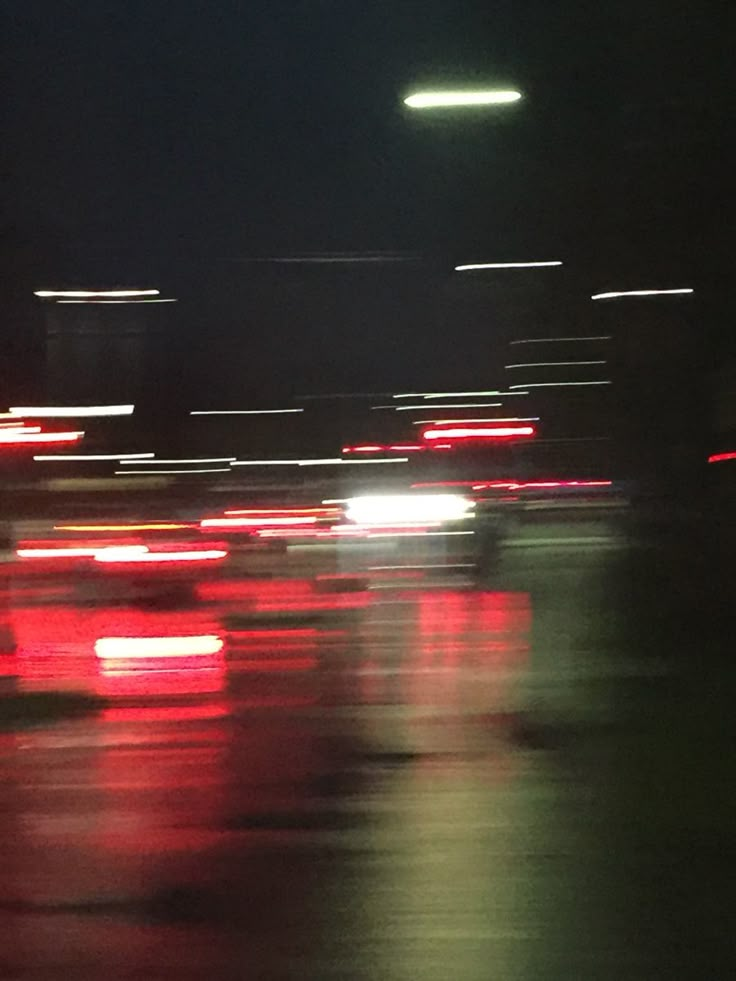 blurry photograph of street lights at night