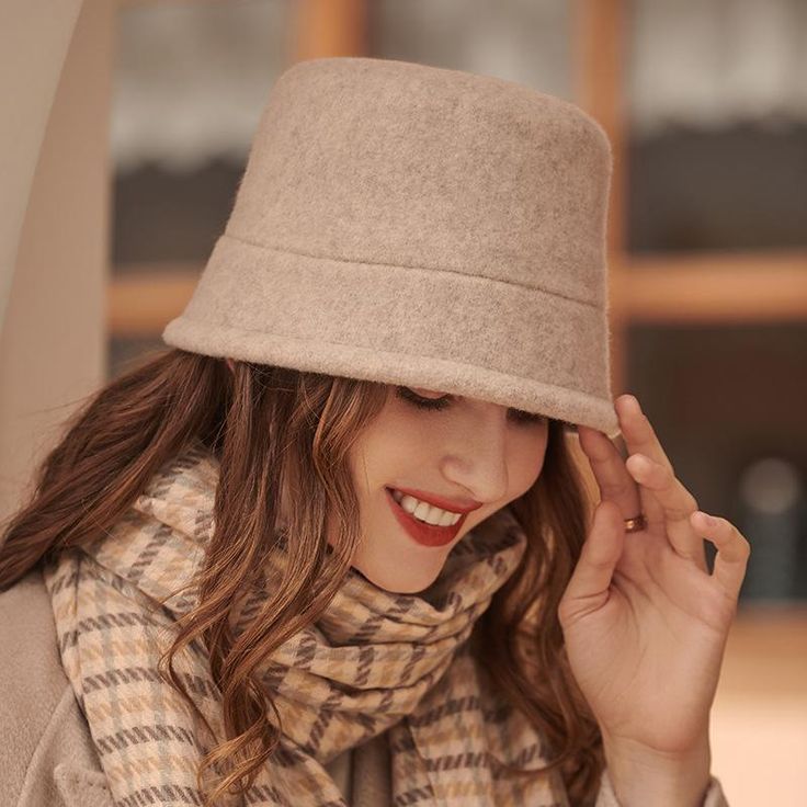 The Emes Shop hat is detailed with a sleek minimalist design. Features a solid color. wool material. and cloche hat design.MATERIAL:100% Brushed Wool BlendCIRCUMFERENCE MEASUREMENTS: 56-58cm 22-23in Wide Brim Beige Felt Hat For Winter, Beige Wide Brim Felt Hat For Winter, Beige Winter Fedora Hat, Beige Fedora Winter Hat, Casual Beige Fedora For Winter, Beige Short Brim Felt Hat For Winter, Beige Felt Hat With Short Brim For Winter, Casual Cloche Hat For Fall, Beige Brimmed Felt Hat For Winter