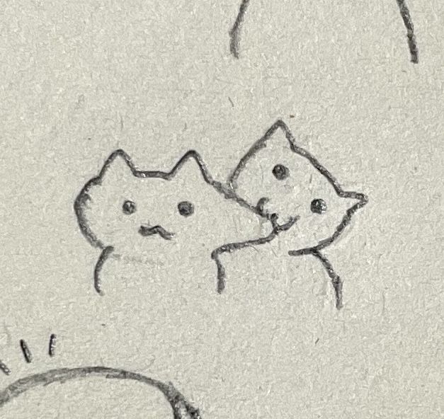 a drawing of two cats hugging each other