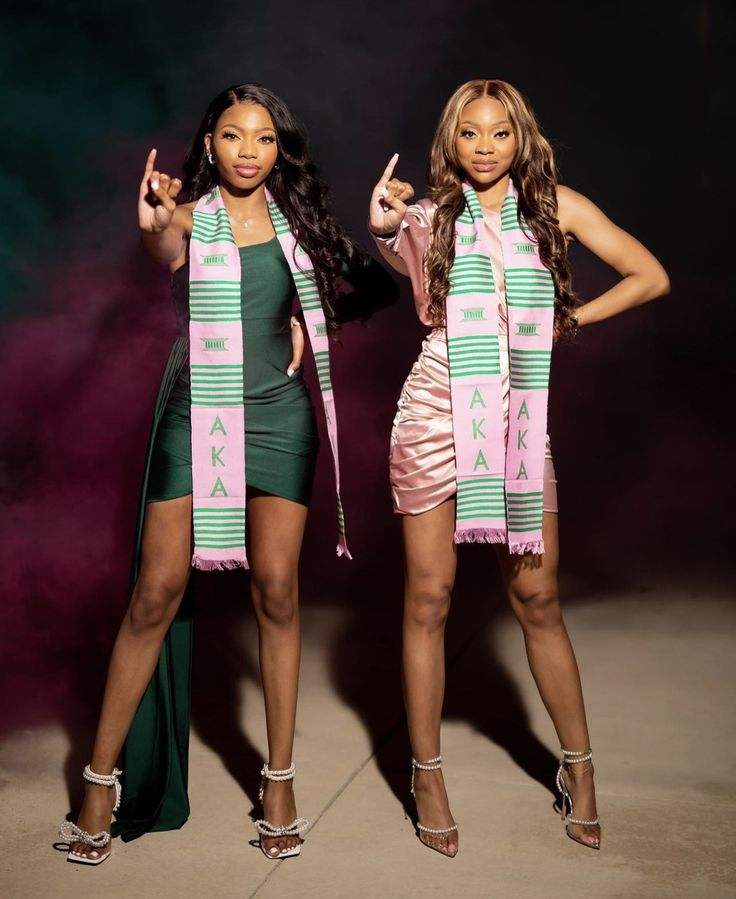 two beautiful young women standing next to each other