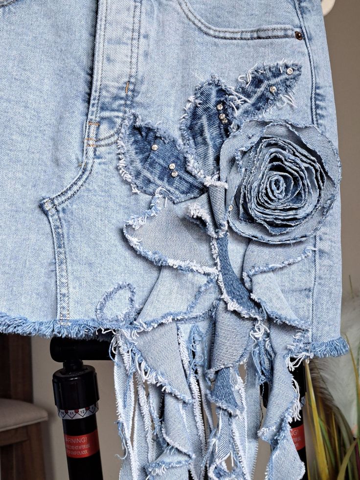 a denim skirt with flowers on it