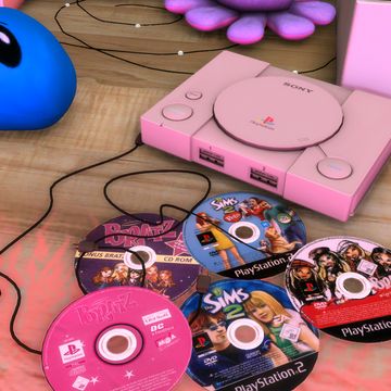 there are many video game discs on the table