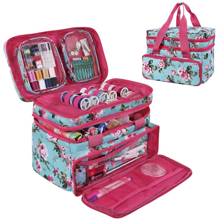 two pieces of pink and blue flowered suitcases with various items in them on white background