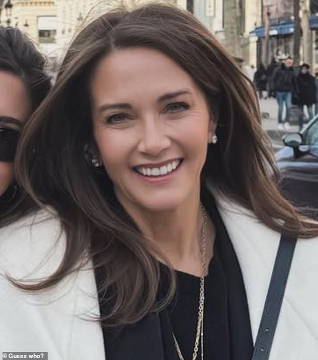 two women standing next to each other smiling