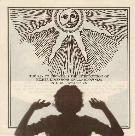 an advertisement for the sun and moon, with a silhouette of a person holding their hands up in front of them