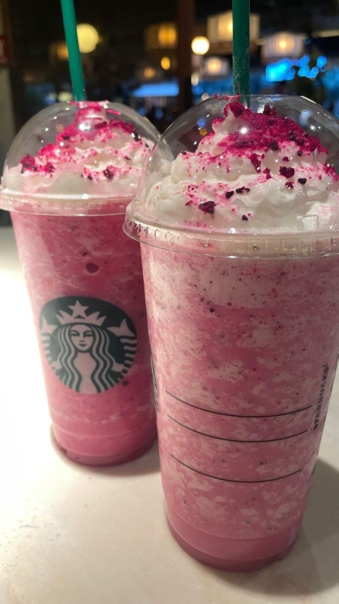 two starbucks drinks with pink sprinkles on top