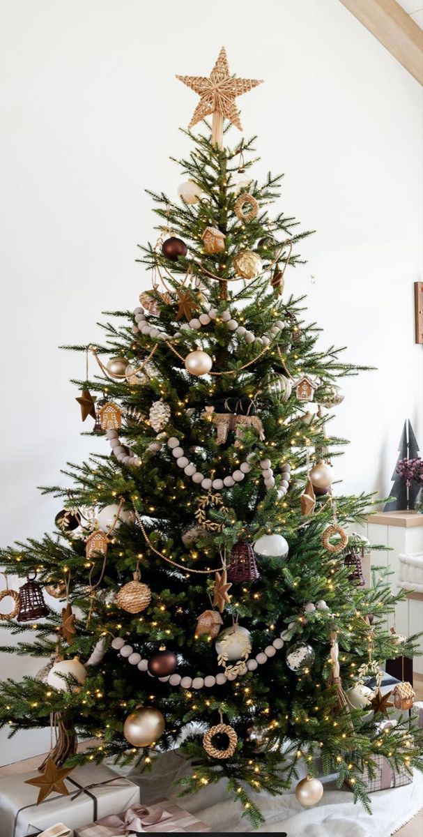 a decorated christmas tree in a living room