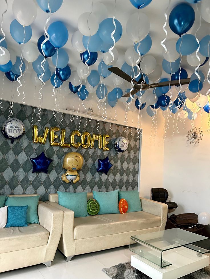 a living room filled with furniture and balloons