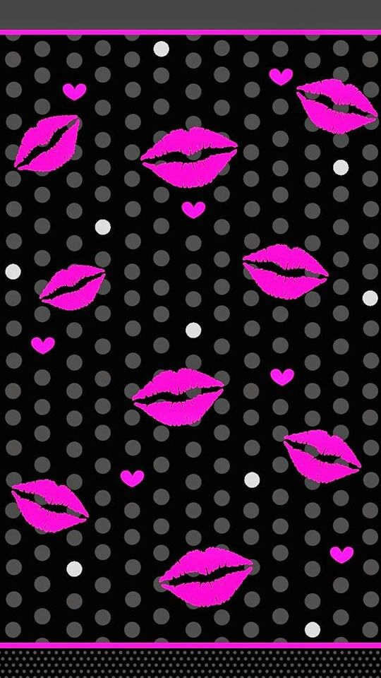 pink lips on black and white polka dots with hearts in the middle, as if it were an art project