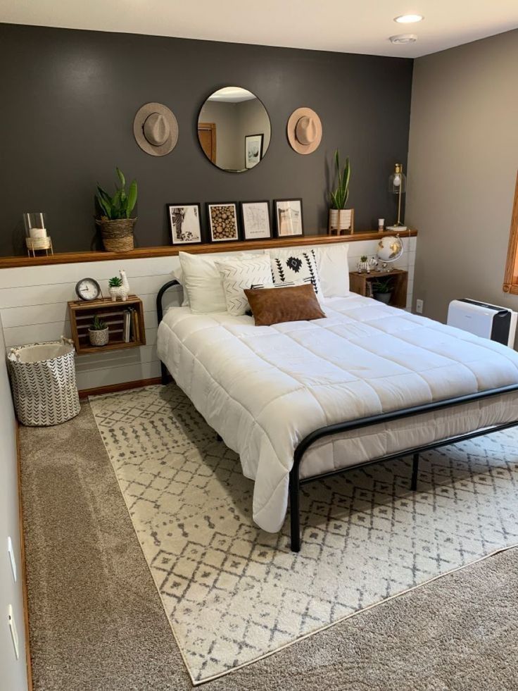 a bed sitting in a bedroom on top of a rug