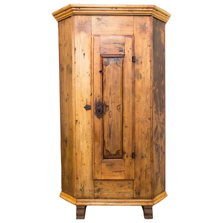 an old wooden armoire is shown against a white background