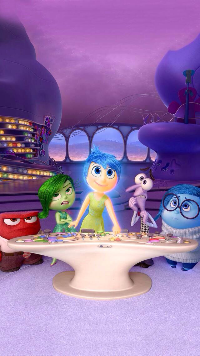 cartoon characters are gathered around a table in the middle of a room with lights on