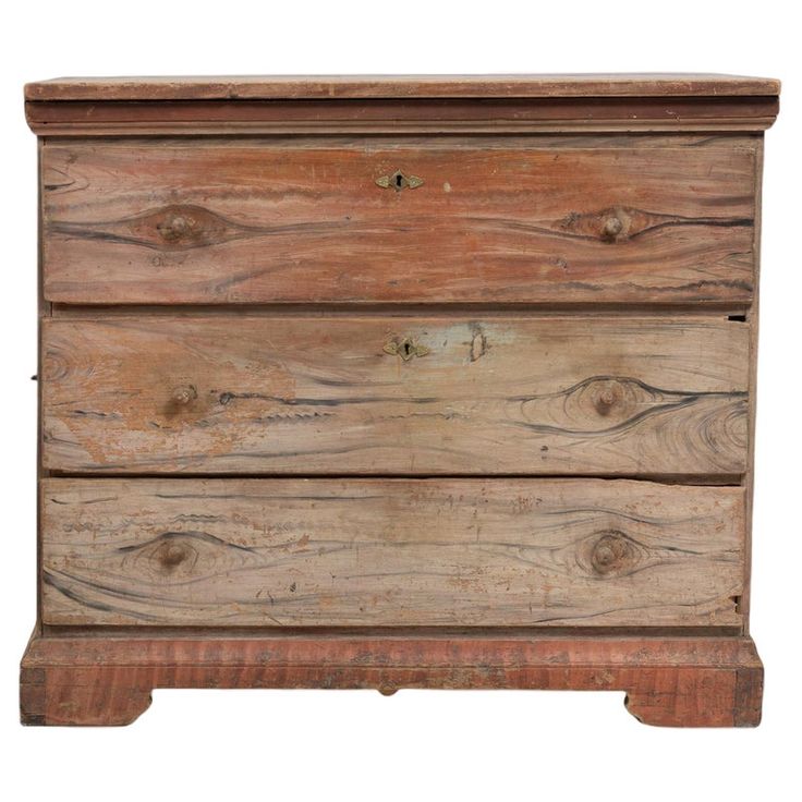 an old chest of drawers with wood grains on the top and bottom, isolated against a white background