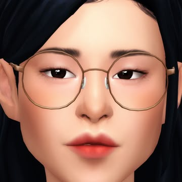 a woman wearing glasses with long black hair and brown eyeliners is looking at the camera