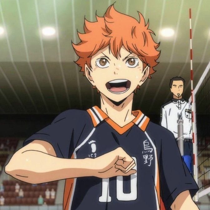 an anime character with red hair pointing at something in front of him and another man standing behind him