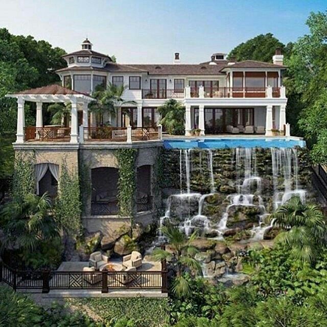 this is an artist's rendering of a mansion with a waterfall in the front yard