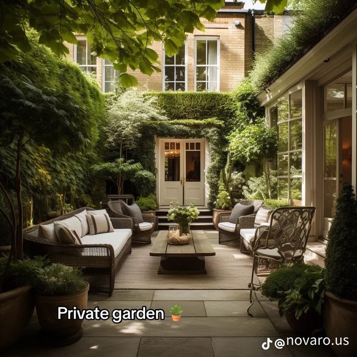 an outdoor living area with couches, tables and potted plants on the patio