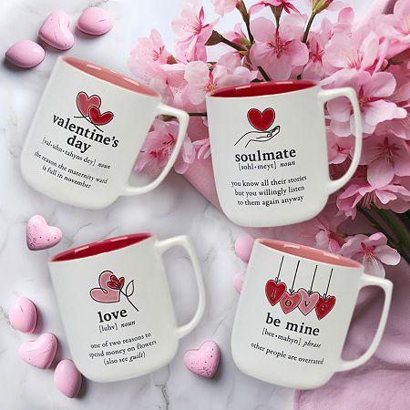 three coffee mugs with valentine's day messages on them next to pink flowers