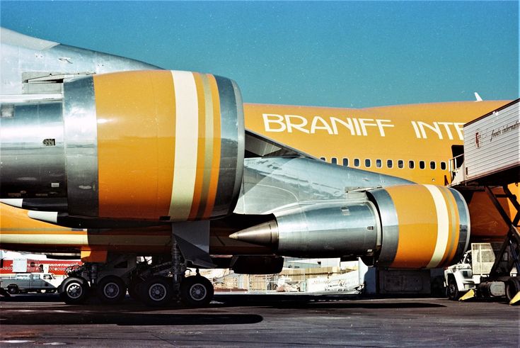 a large jetliner sitting on top of an airport tarmac