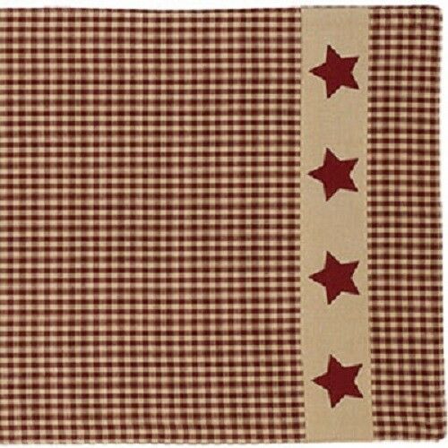 a red and white checkered table cloth with stars on it