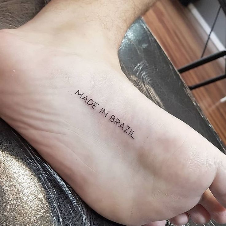 a person with a small tattoo on their foot that says made in brazil and the word'made in brazil '