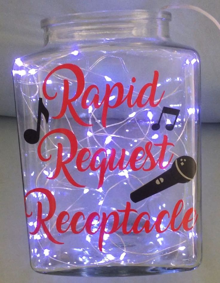 a lighted glass jar with the words rapid request receptacle