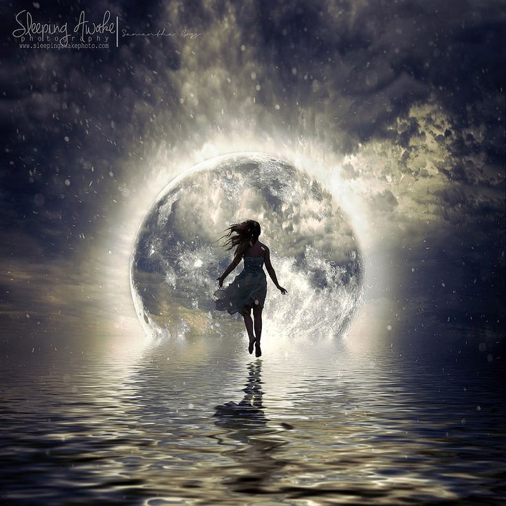 a woman is walking across the water in front of a full moon with clouds and stars