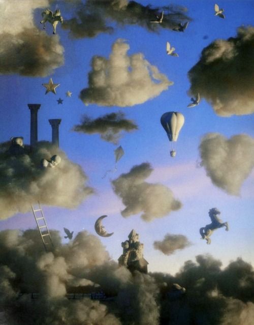 the sky is filled with lots of clouds and birds flying above it, while there are some type of objects floating in the air