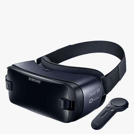 the samsung gear vr headset is next to a remote control