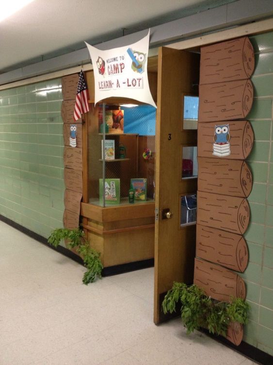 an entrance to a library with plants and books on the shelves in front of it