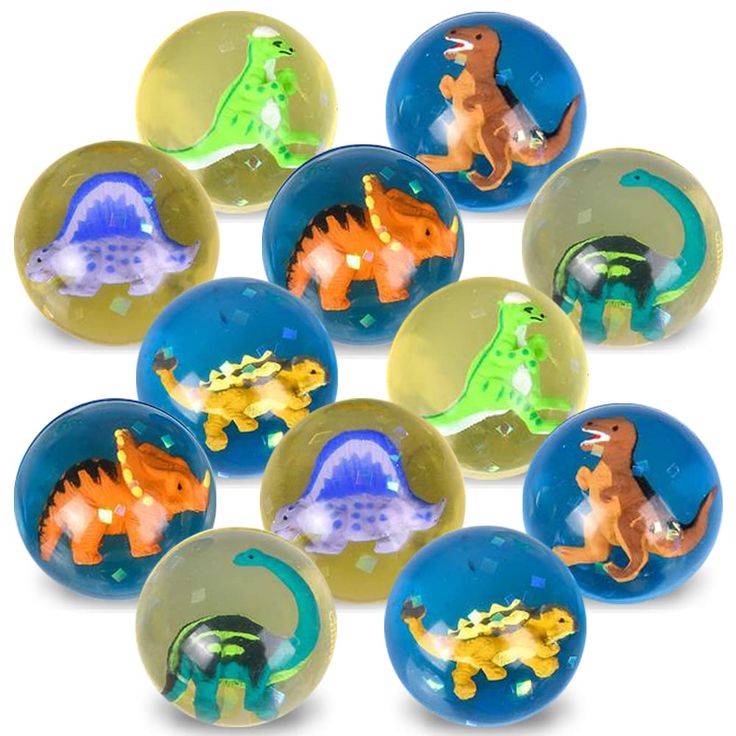 small plastic dinosaurs in different shapes and sizes on blue balls with green, orange, and yellow highlights