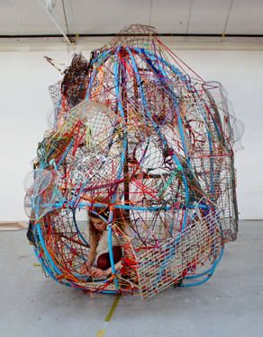 a sculpture made out of wires and plastic