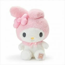 a pink hello kitty stuffed animal on a white background