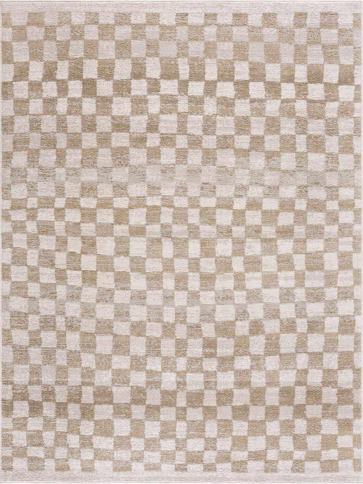 a beige and white rug with squares on it