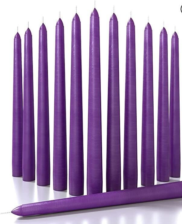 purple candles lined up next to each other