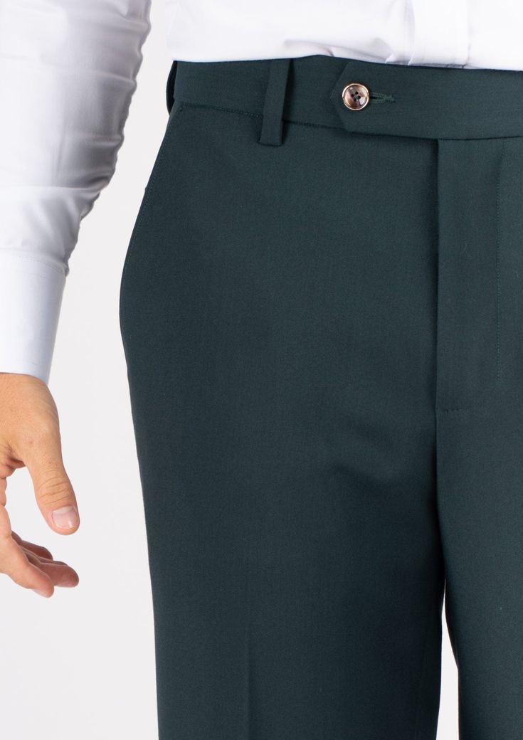 Make a statement with these Ellis Emerald Green Stretch Pants, crafted with sophisticated stretch cotton fabric. Step out with dapper sophistication in these unique custom made pants. Fitted Pants For Business Casual, Semi-formal Elastane Pants With Welt Pockets, Fitted Chinos With Welt Pockets, Fitted Leather Trousers, Fitted Tapered Leg Bottoms With Welt Pockets, Semi-formal Stretch Trousers, Fitted Ankle-length Pants With Welt Pockets, Fitted Ankle-length Bottoms With Welt Pockets, Fitted Work Pants With Welt Pockets